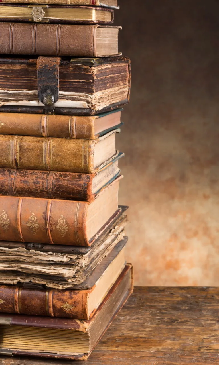 Stack of books used as a yoga resource.